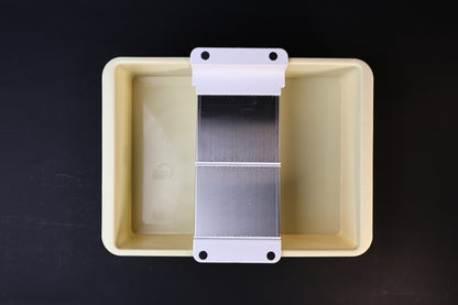 Sharpening station kit — close-up of adjustable stone holder platform and bracket detail in tray