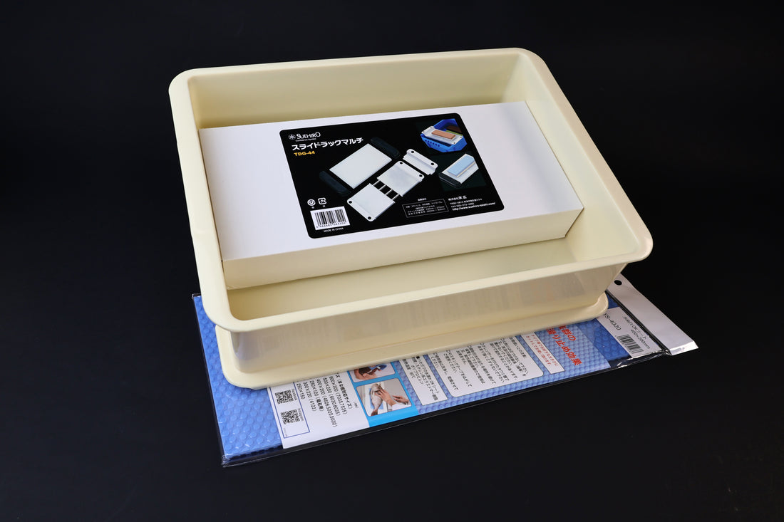 Sharpening station kit — top-down view of stone holder installed in soaking tray