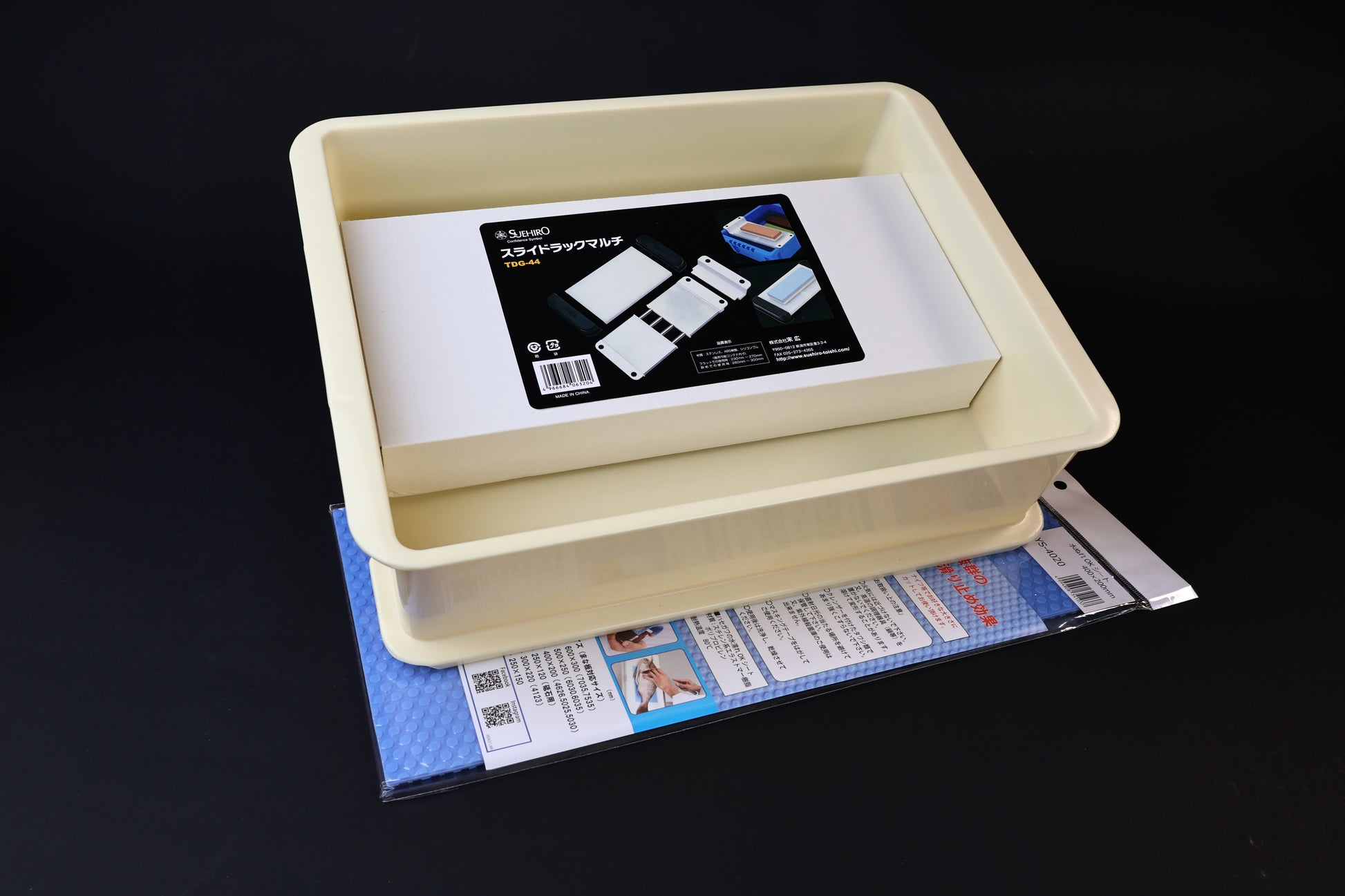 Sharpening station kit — top-down view of stone holder installed in soaking tray