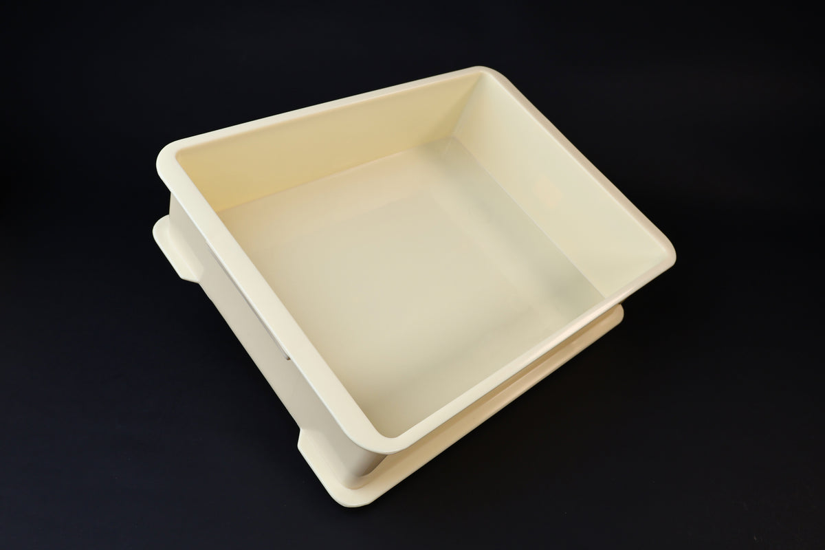 Sharpening station kit — tray with stone holder installed over silicon mat and Japanese packaging