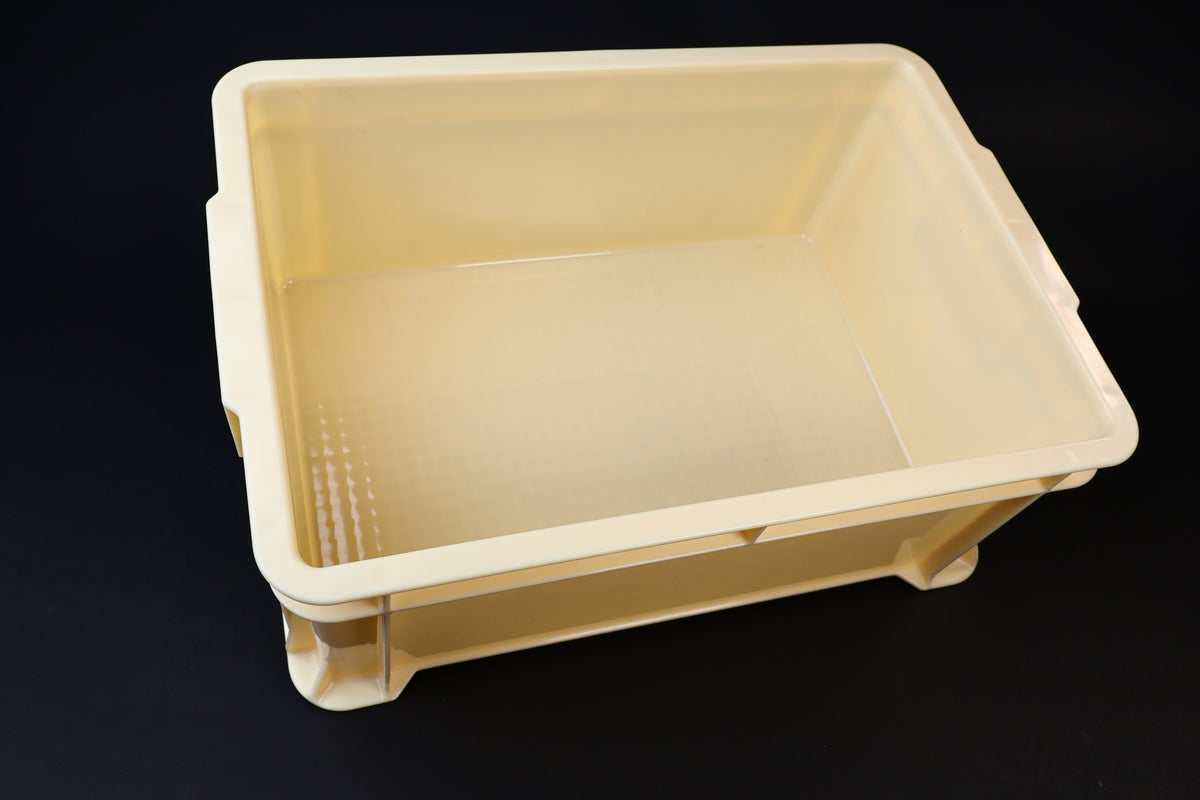 Sharpening station kit tall — empty soaking tray showing deep interior, side handles, and non-slip base