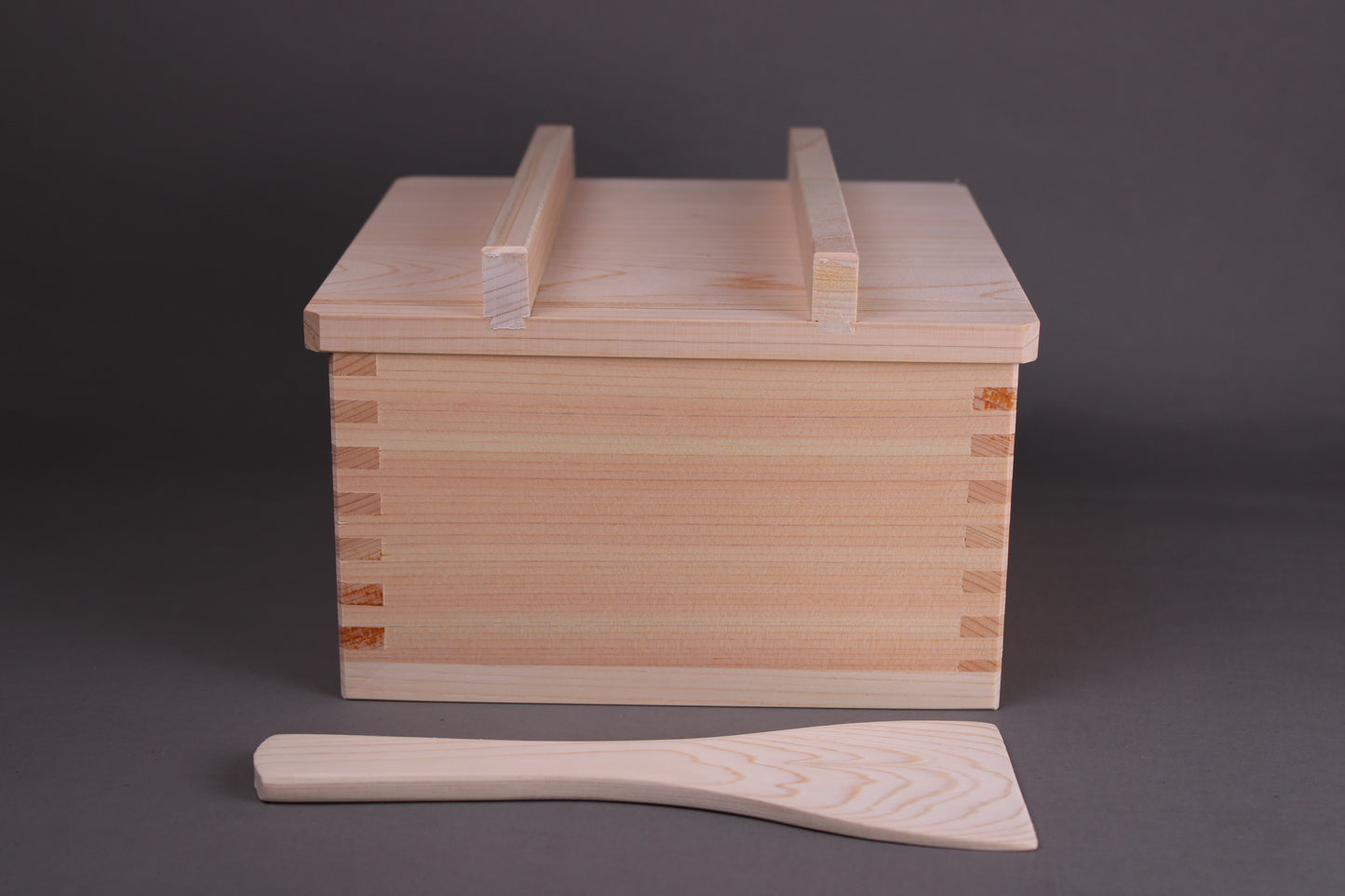 square hinoki rice chest 5 cup capacity with nosebitsu lid atop and wood rice scoop in front by yamacoh