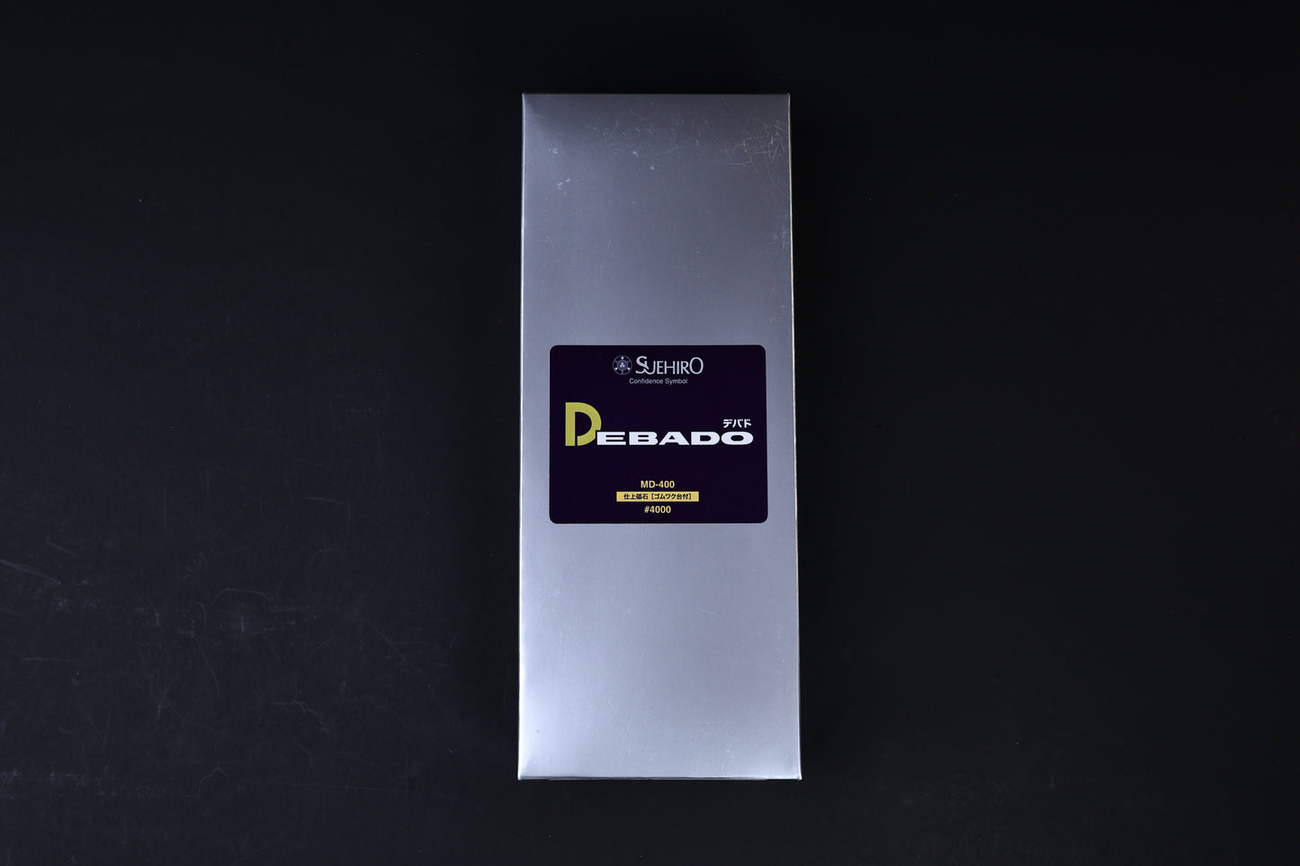 Suehiro Debado MD-400 #4000 sharpening stone — silver retail box with Debado label front view