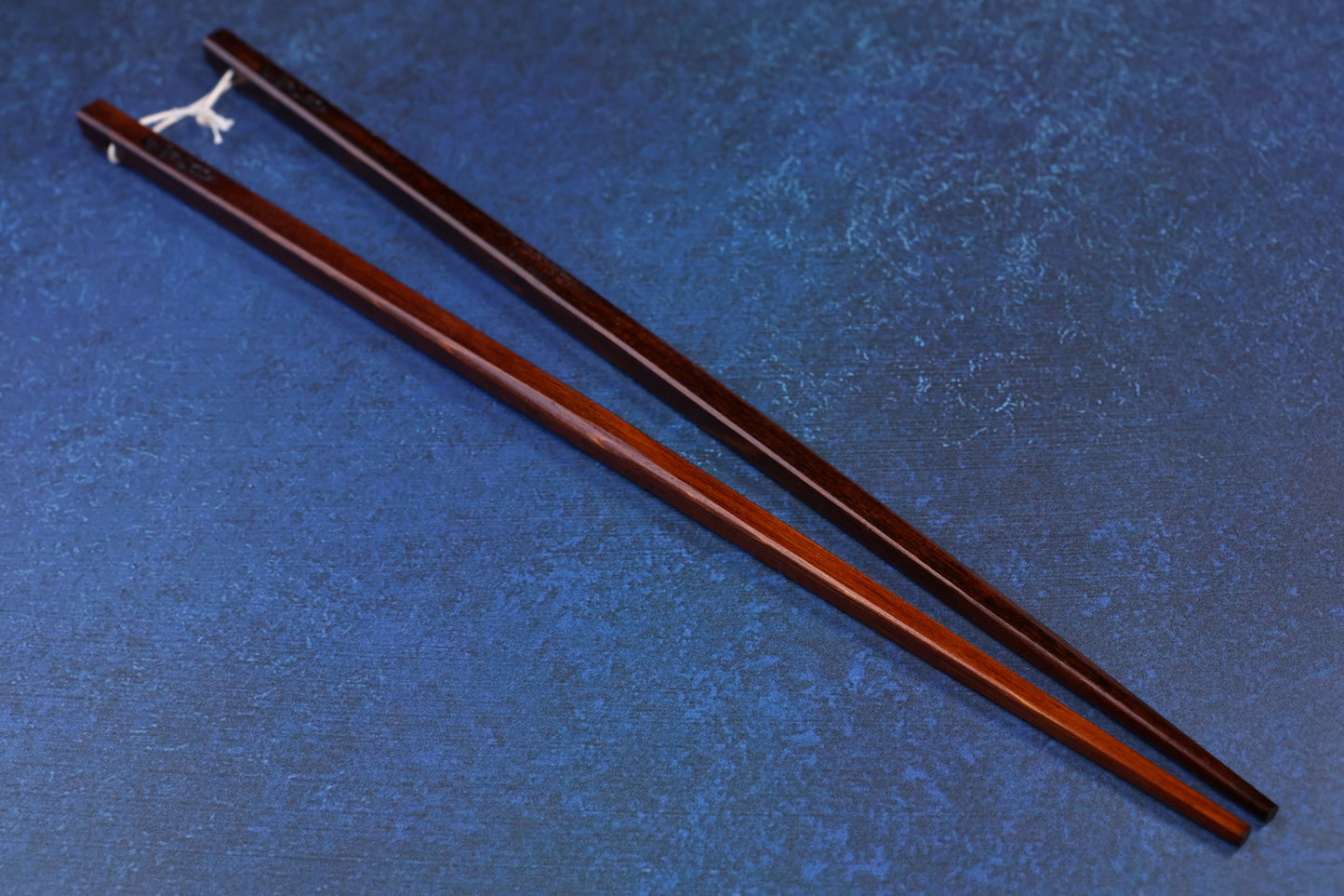 Suri Urushi cooking chopsticks 33cm — diagonal view showing urushi lacquer finish and taper