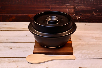 Suzuki Co. Hagama Rice Cooker 3 Cup wooden otoshibuta lid raised above pot rim