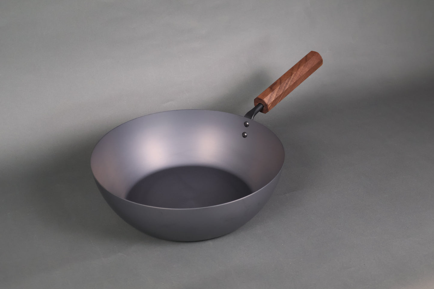 rust resistant japanese iron fry pan with wooden grip and octagonal design