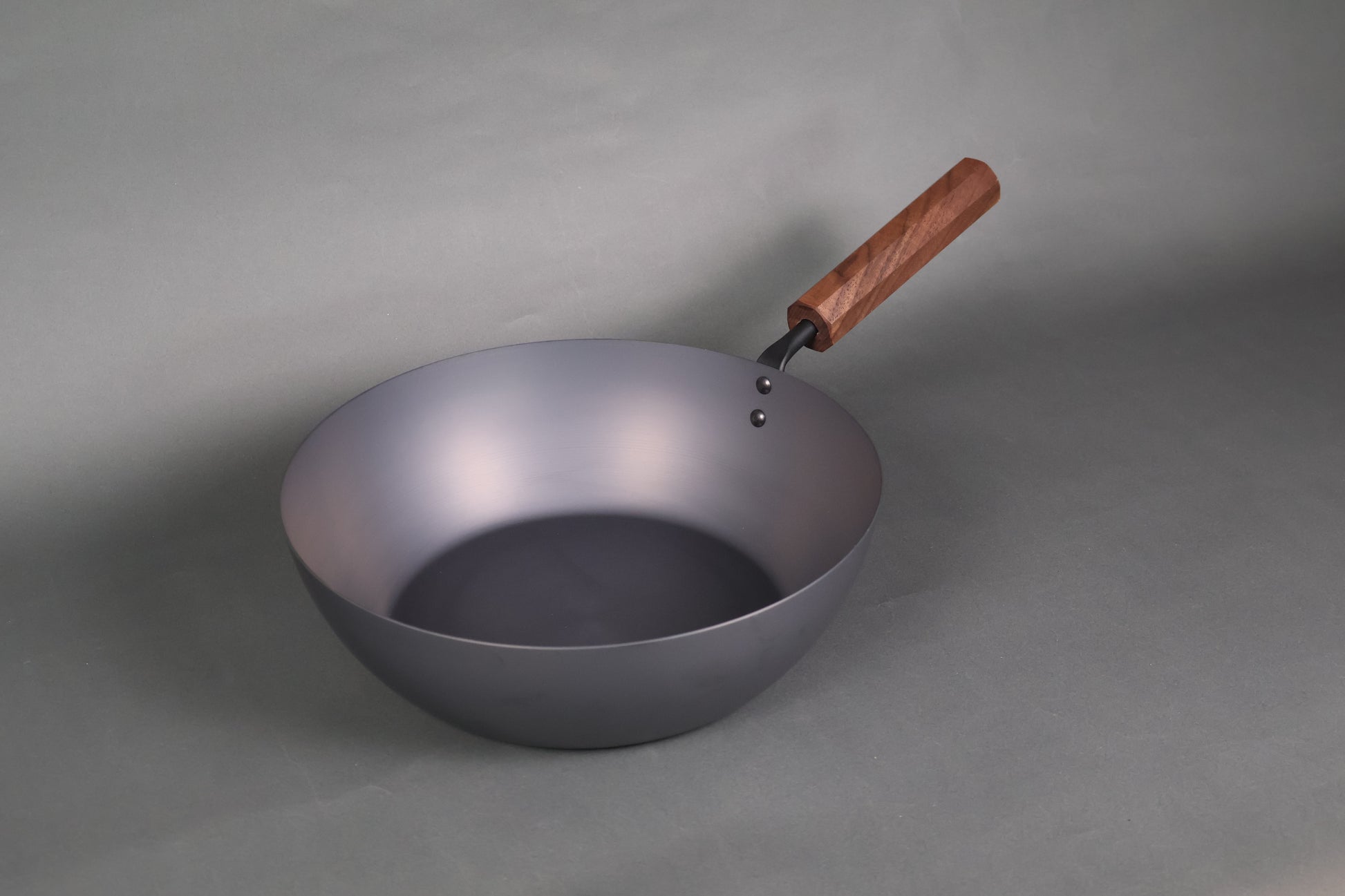 rust resistant japanese iron fry pan with wooden grip and octagonal design