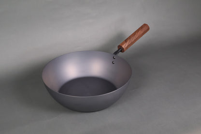 rust resistant japanese iron fry pan with wooden grip and octagonal design