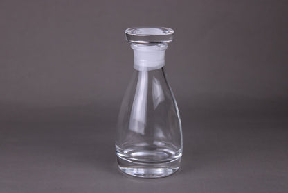 the soy sauce cruet shiny crystal surface with grey background