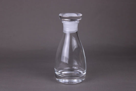 the soy sauce cruet shiny crystal surface with grey background