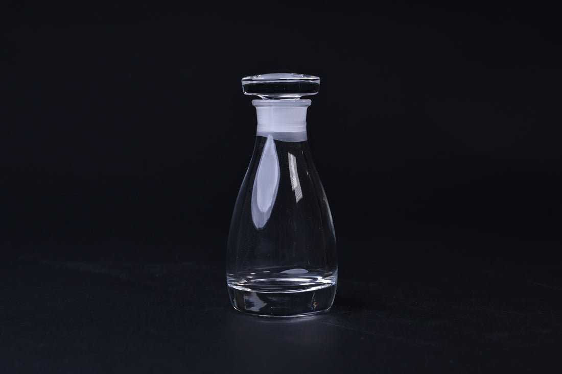 THE Soy Sauce Cruet — full side view of clear glass cruet with stopper seated
