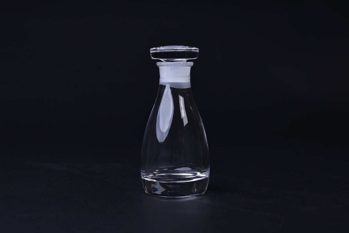 THE Soy Sauce Cruet — full side view of clear glass cruet with stopper seated
