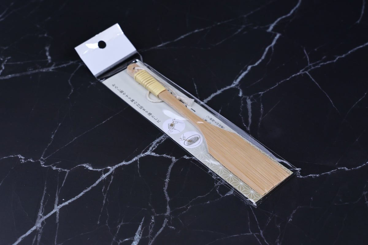 Yakumiyose bamboo brush 18cm — angled view showing brush tines and Japanese packaging