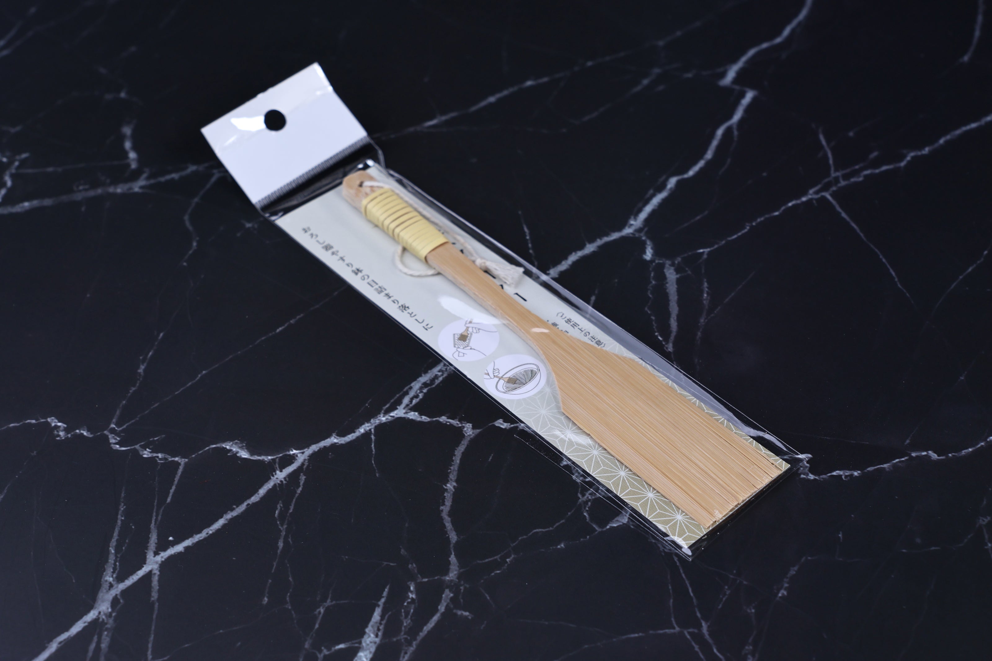 Yakumiyose bamboo brush 18cm — angled view showing brush tines and Japanese packaging