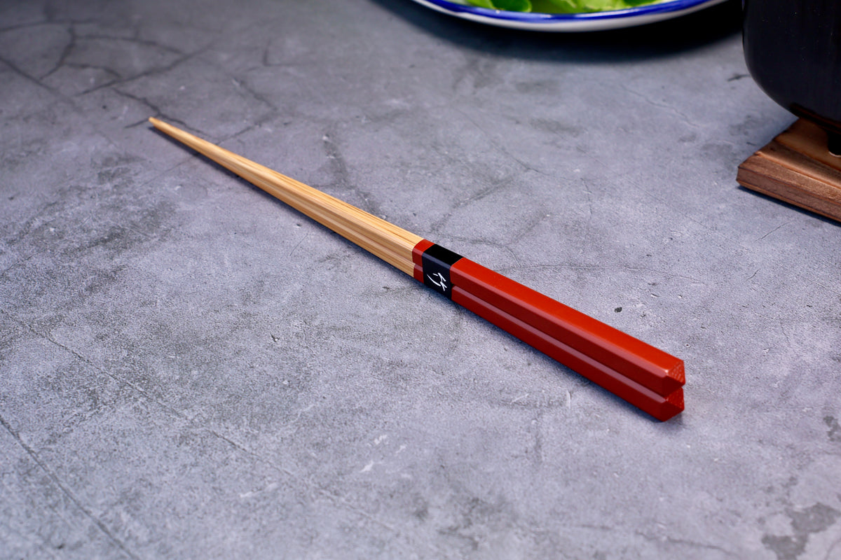 Yamacoh Diamond Cut Saibashi 24cm — red pair full profile on concrete