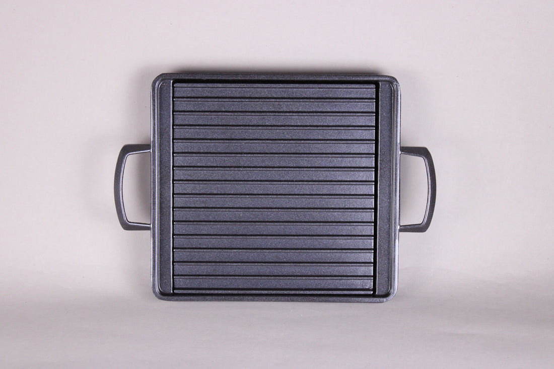 Yamacoh square grill — overhead view showing full ridged non-stick cooking surface and dual handles