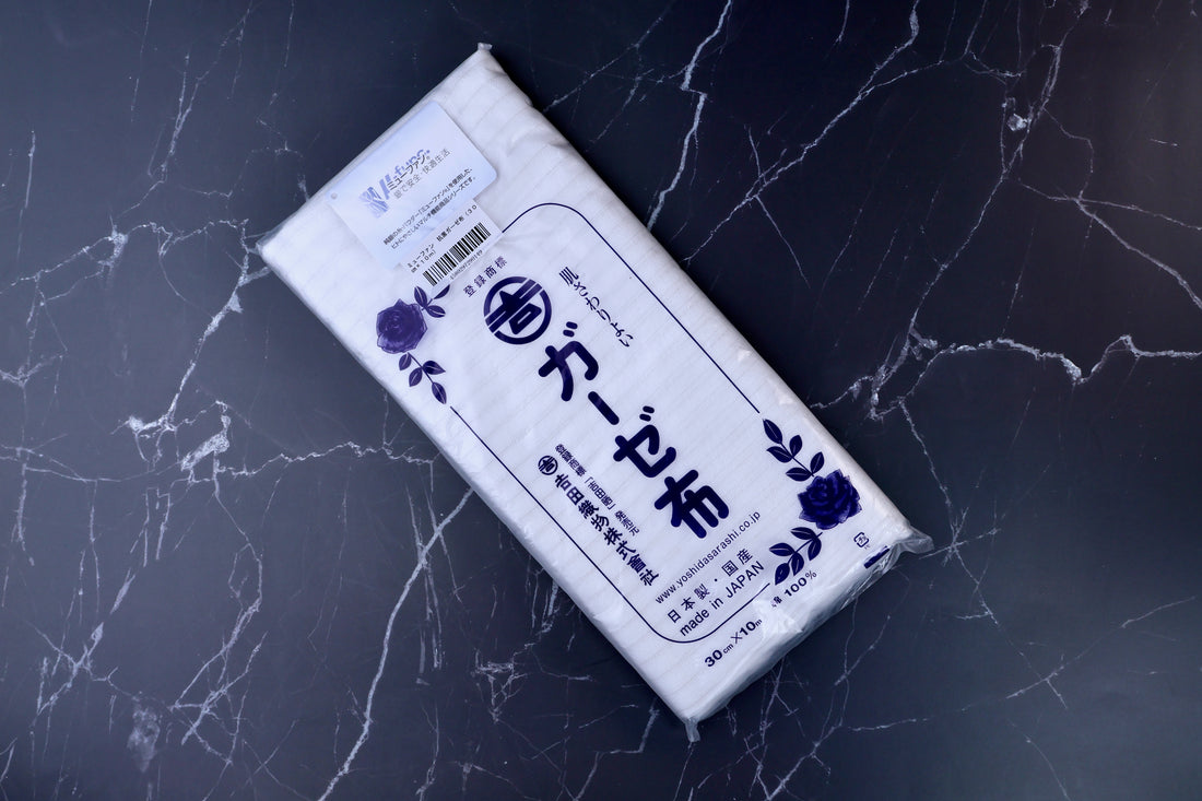 Yoshida Sarashi antibacterial kitchen gauze — full front view of folded package showing brand label and dimensions