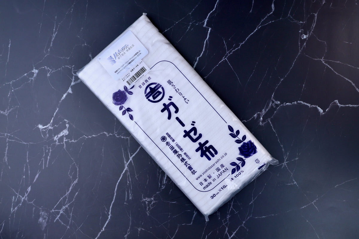 Yoshida Sarashi antibacterial kitchen gauze — full front view of folded package showing brand label and dimensions