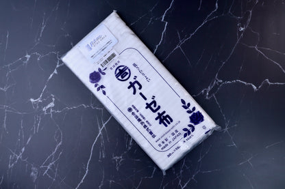 Yoshida Sarashi antibacterial kitchen gauze — full front view of folded package showing brand label and dimensions
