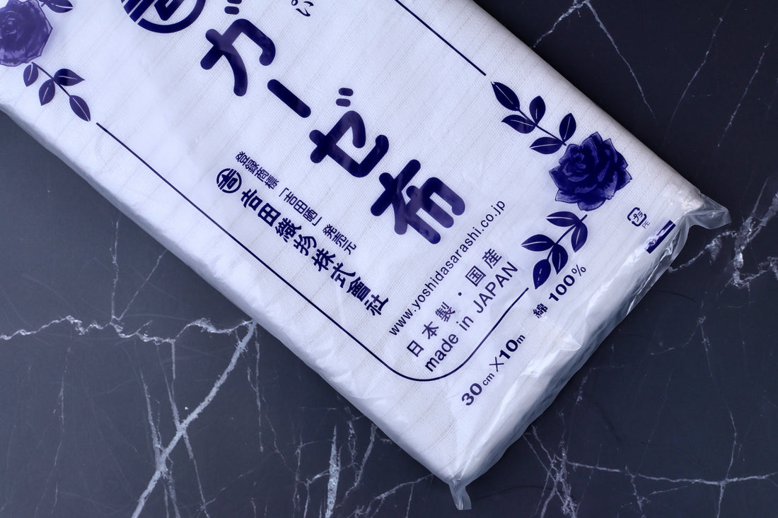 Yoshida Sarashi antibacterial kitchen gauze — close-up of Japanese packaging label showing Made in Japan and 100% cotton