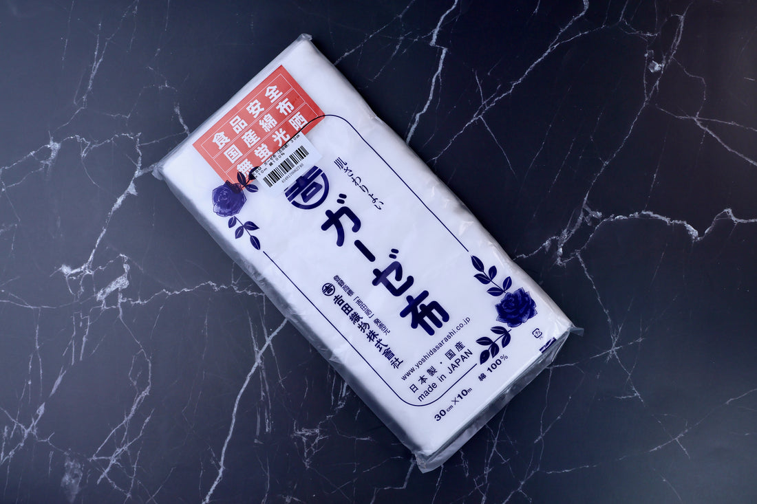Yoshida Sarashi kitchen gauze — full package view showing brand label, red food safety sticker, and Made in Japan