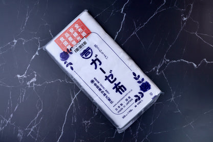 Yoshida Sarashi kitchen gauze — full package view showing brand label, red food safety sticker, and Made in Japan