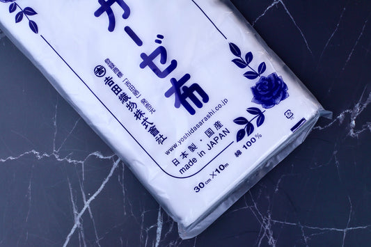 Yoshida Sarashi kitchen gauze — close-up of Japanese packaging showing Made in Japan, 100% cotton, and dimensions