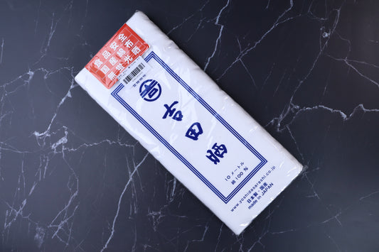 Yoshida Sarashi kitchen towel — full packaging front showing brand mark and food-safe cotton label
