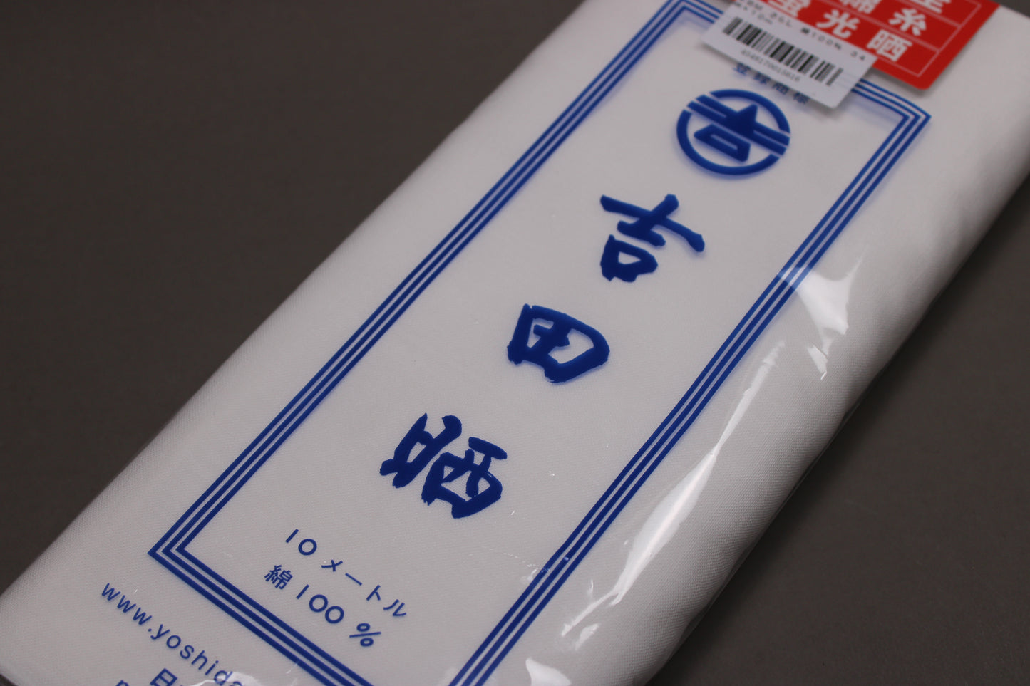 closeup showing yoshida sarashi package logo brand measurements 