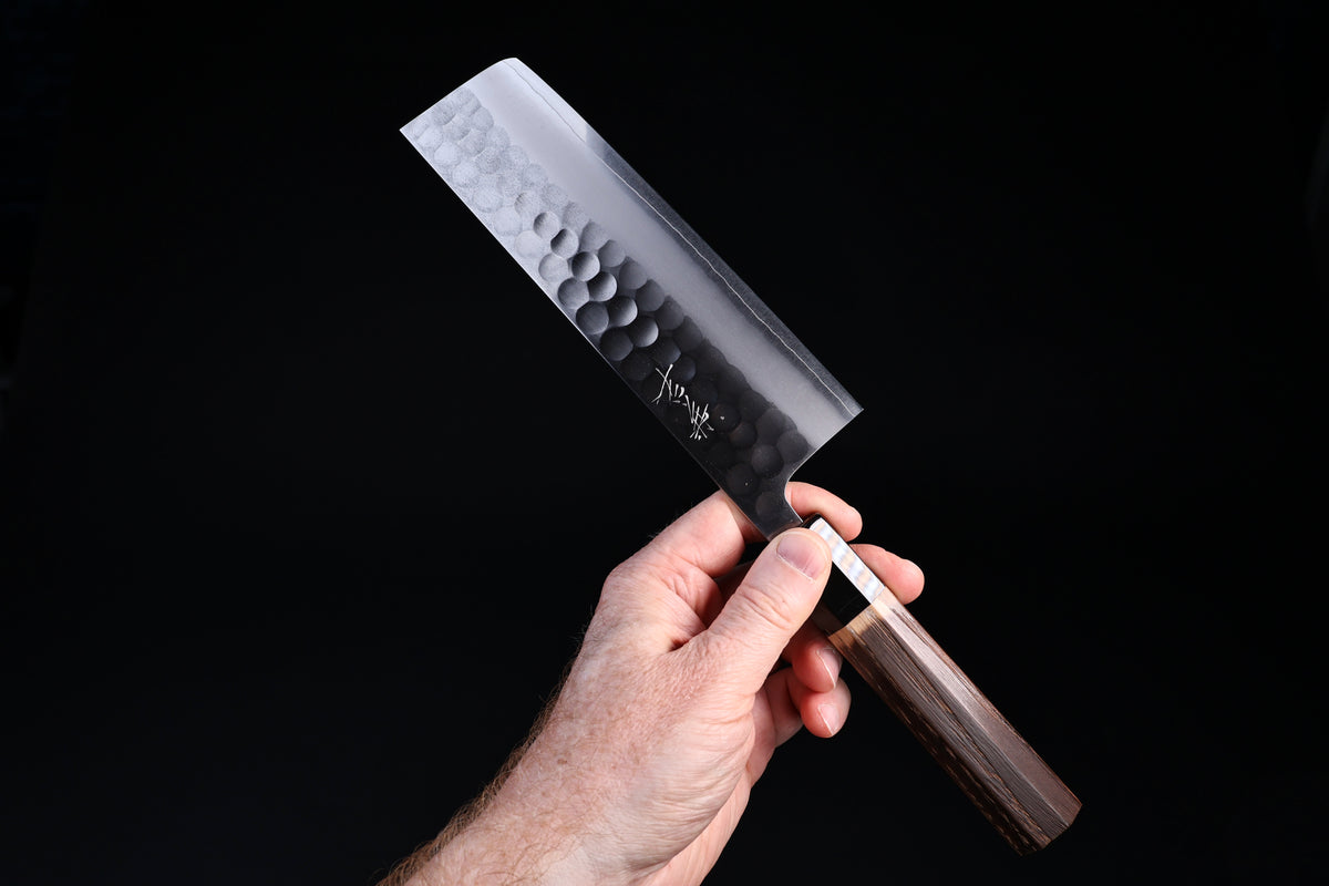 Tsuchime hammered finish detail on Yoshikane SKD Nakiri 165mm blade face
