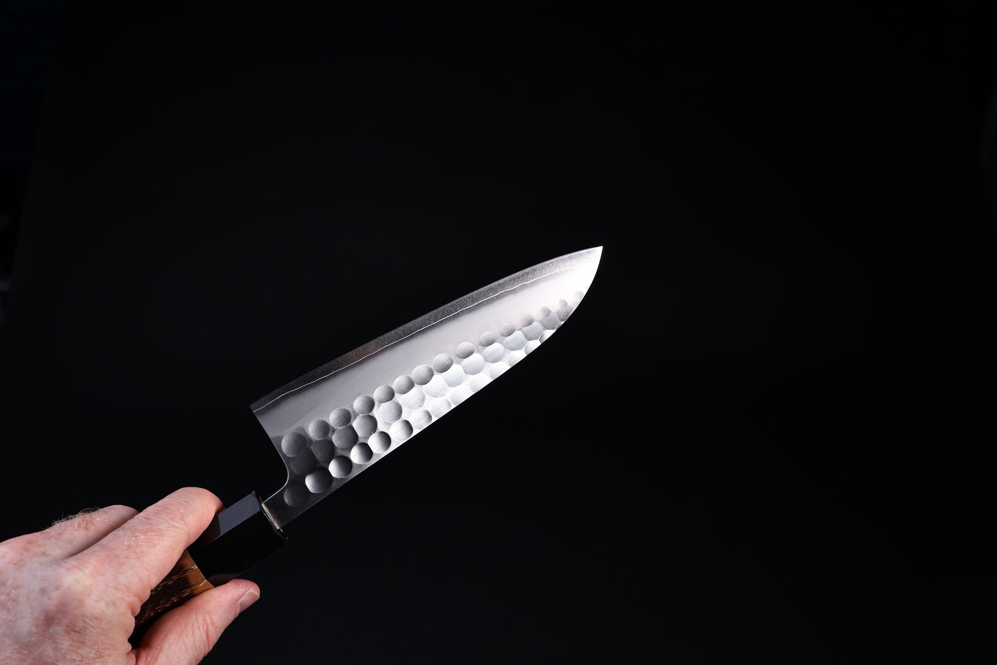 Yoshikane SKD Santoku 165mm blade profile showing tsuchime finish and polished edge